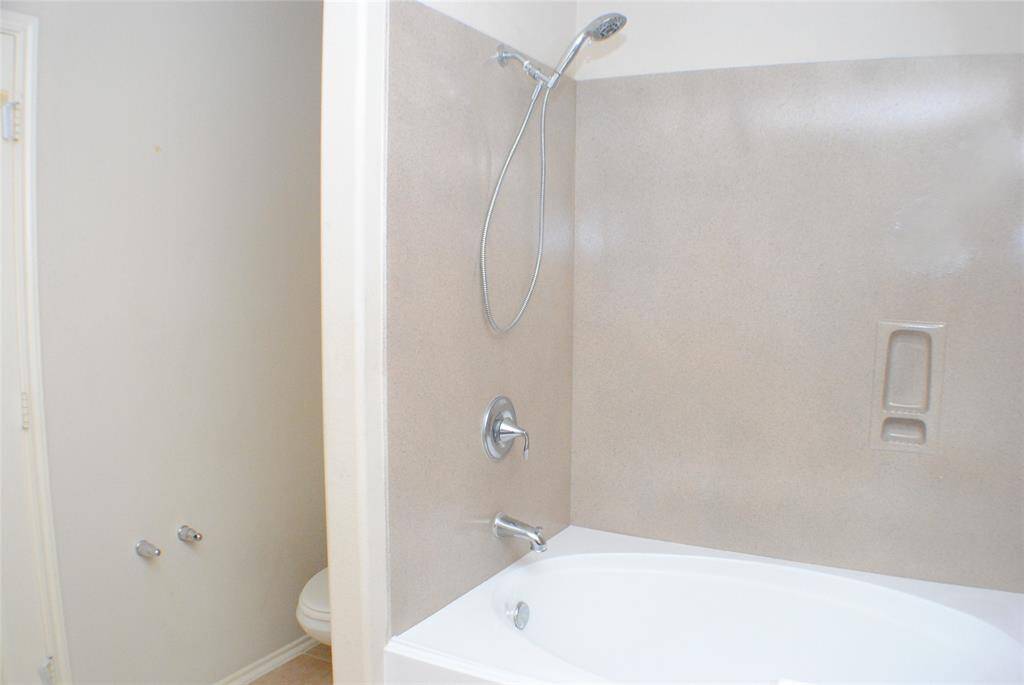 Primary bath water closet and shower/soaking tub combo