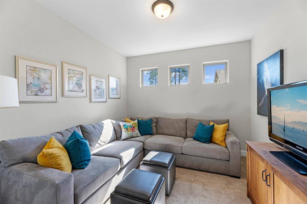 Backyard featuring an extended covered patio with room to relax and entertain. This lot is one of the deeper lots in the community and with just some simple added landscaping could be your private oasis. A perfect space to enjoy coffee in the morning listening to the birds.