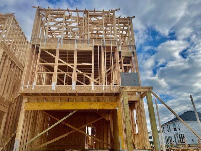 Three-story home with 4 bedrooms, 3.5 baths and 2 car garage.