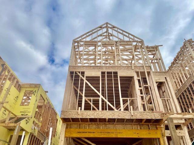 Three-story home with 4 bedrooms, 3.5 baths and 2 car garage.