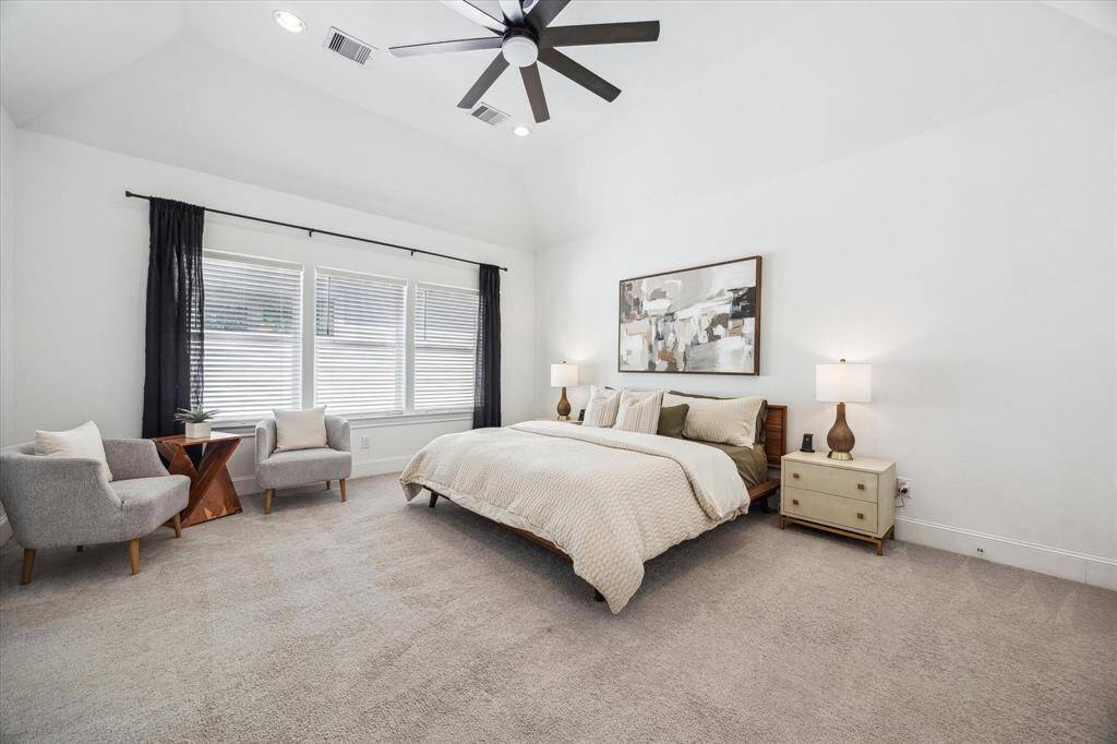 You'll have sweet dreams in this posh third-floor owner's retreat with plush carpet, neutral paint, incredible natural light, a large walk-in closet and a spa-like ensuite bathroom.