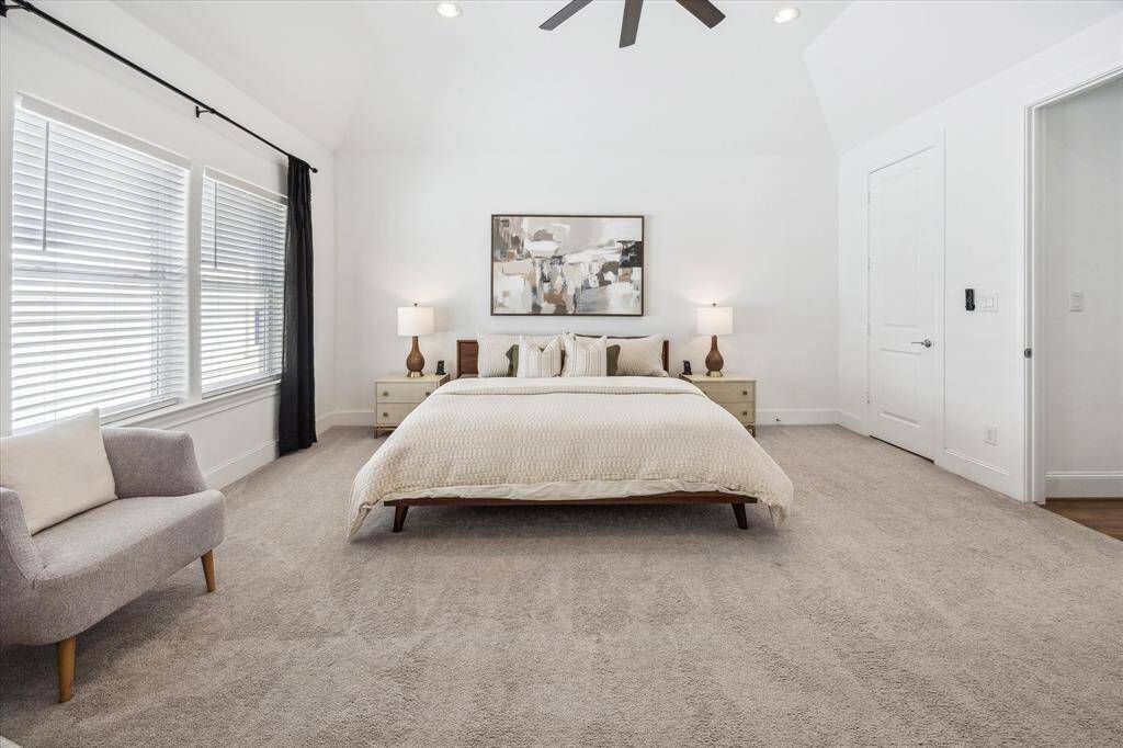 What a beautiful space to begin and end your day. This luxurious owner's suite features soft, soothing finishes and plenty of space to stretch out and unwind. Breathe, you're home now.