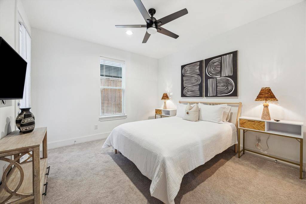 Tucked away on the first floor, this private guest suite offers comfort and convenience with its own ensuite bathroom, a spacious closet, and direct access to a private patio. With a second guest suite located on the third floor, this flexible floor plan is perfect for multi-generational living, extended stays, or creating a quiet retreat for family and friends.