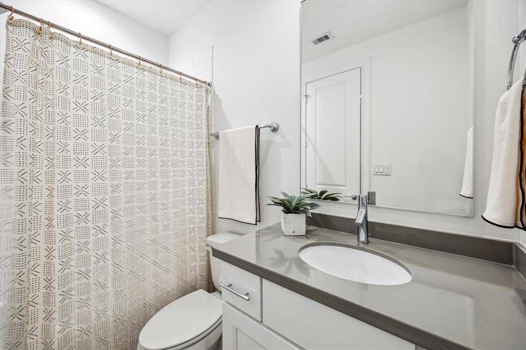 Your family and guests will appreciate the private ensuite bathroom with a sleek single sink vanity and a convenient tub/shower combination.