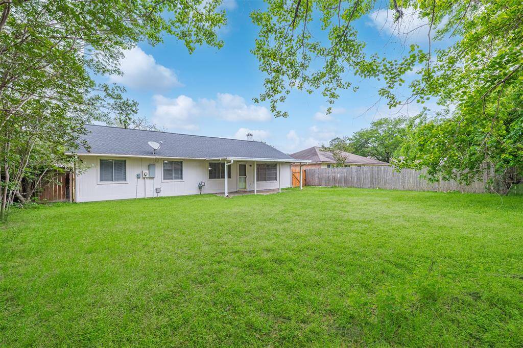 covered patio w/ huge back yard