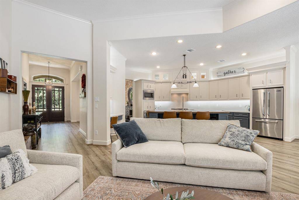 Experience the perfect blend of comfort and sophistication in this beautifully designed open-concept living space—ideal for everyday living and effortless entertaining.