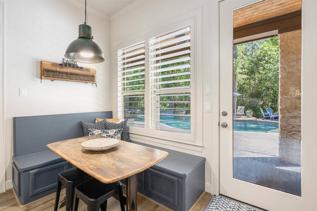 Adorable breakfast nook off the kitchen with ample natural light and overlooks the backyard.