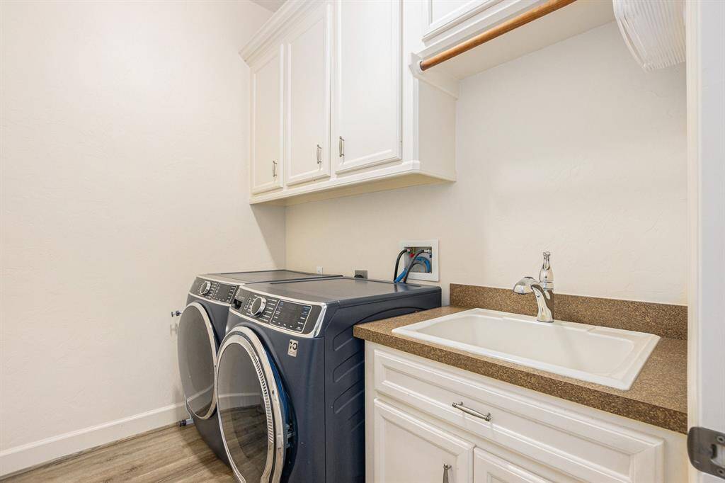 View of the laundry room that is off the kitchen.