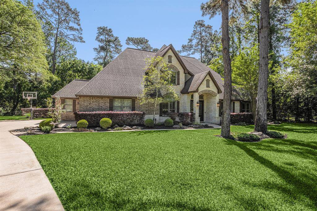 This 1.5 story home has it all! 4 beds, 3.5 baths, a home office, media room, and so much more!