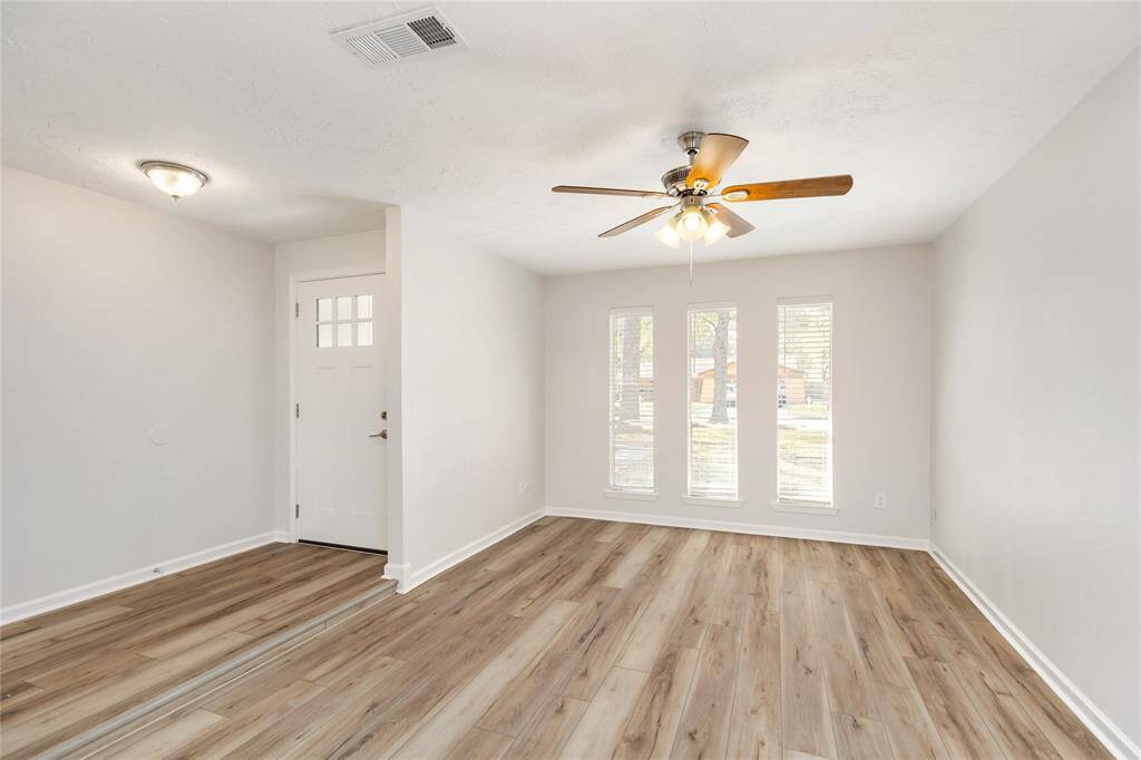 The Formal Living Room is located at the front of the home