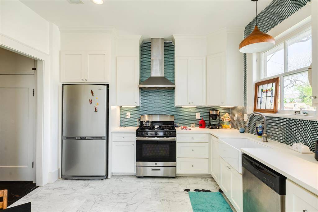Great countertop space and ample storage both above and below countertop.