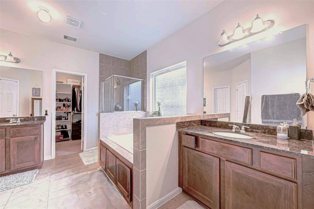 Adjacent to the bedroom, the ensuite bathroom, with modern fixtures and finishes will make your life easy in the rushing hours. The separated sink cabinets will give you privacy and comfort.