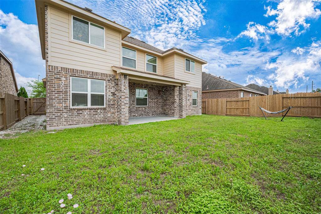 The home has a covered patio and enough space in the back yard for planning an inground pool!!!