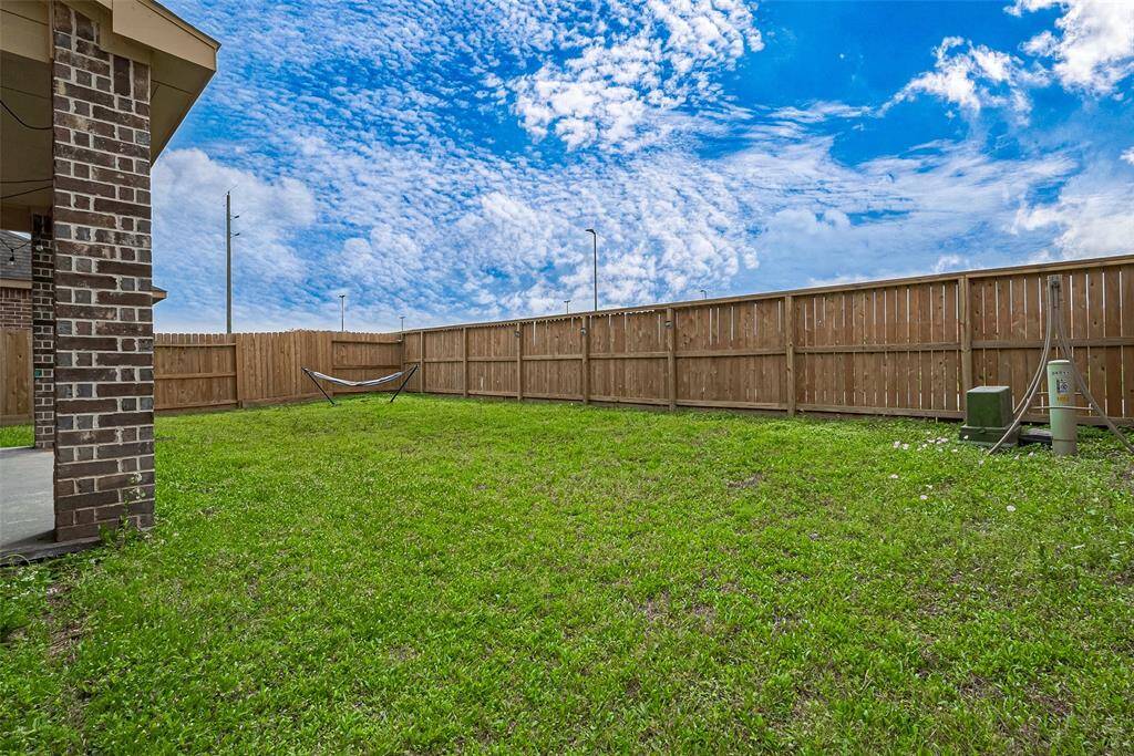 You'll enjoy a large, fenced backyard, where maybe you can build a covered patio, your own garden, or a gazebo, the possibilities are endless!!