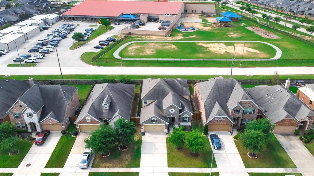 24511 Peroni Drive backs to Hubenak Elementary School, which is a short <1/4 mile walk from your front door.