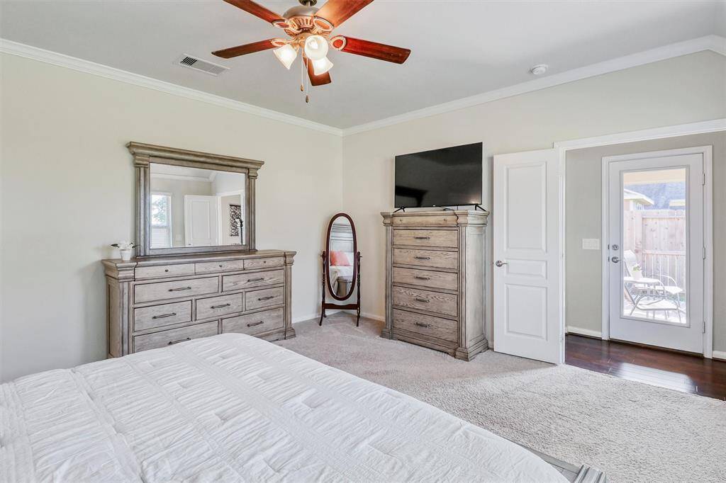 This serene retreat is generously sized to accommodate a king bed and large furnishings with ease, also with nearby access to the patio—perfect for enjoying your morning coffee or unwinding at sunset.