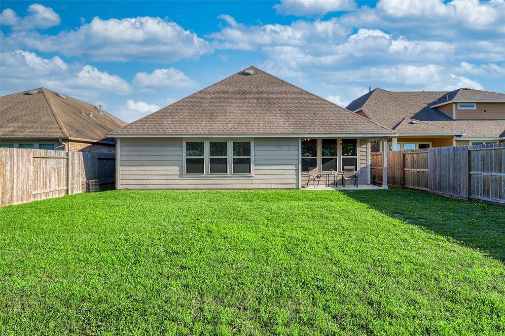 With plenty of green space to roam, the backyard is ideal for pets, play, or even future additions like a garden or playscape.