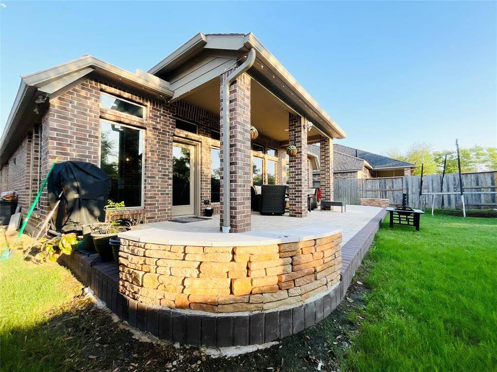 Extended Patio with sitting area.