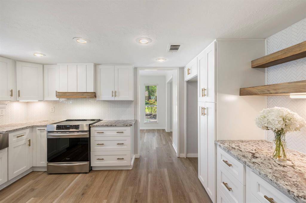 The luxurious kitchen is comprised of many dazzling updates that makes it magazine-worthy!