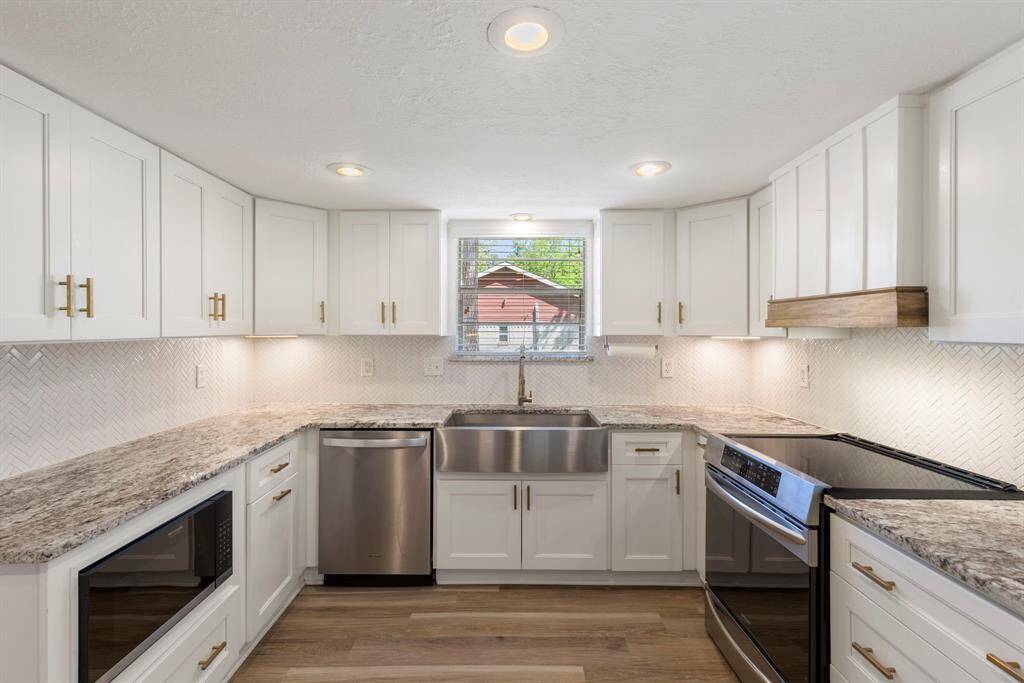The luxurious kitchen is comprised of many dazzling updates that makes it magazine-worthy!