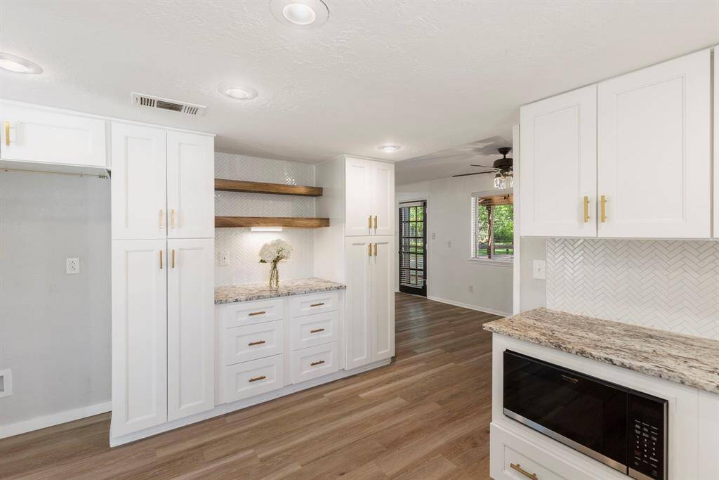 The luxurious kitchen is comprised of many dazzling updates that makes it magazine-worthy!