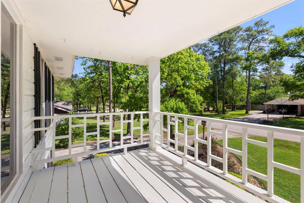 Sit out on the balcony with your morning coffee and take in the gorgeous landscaping surrounding your home.