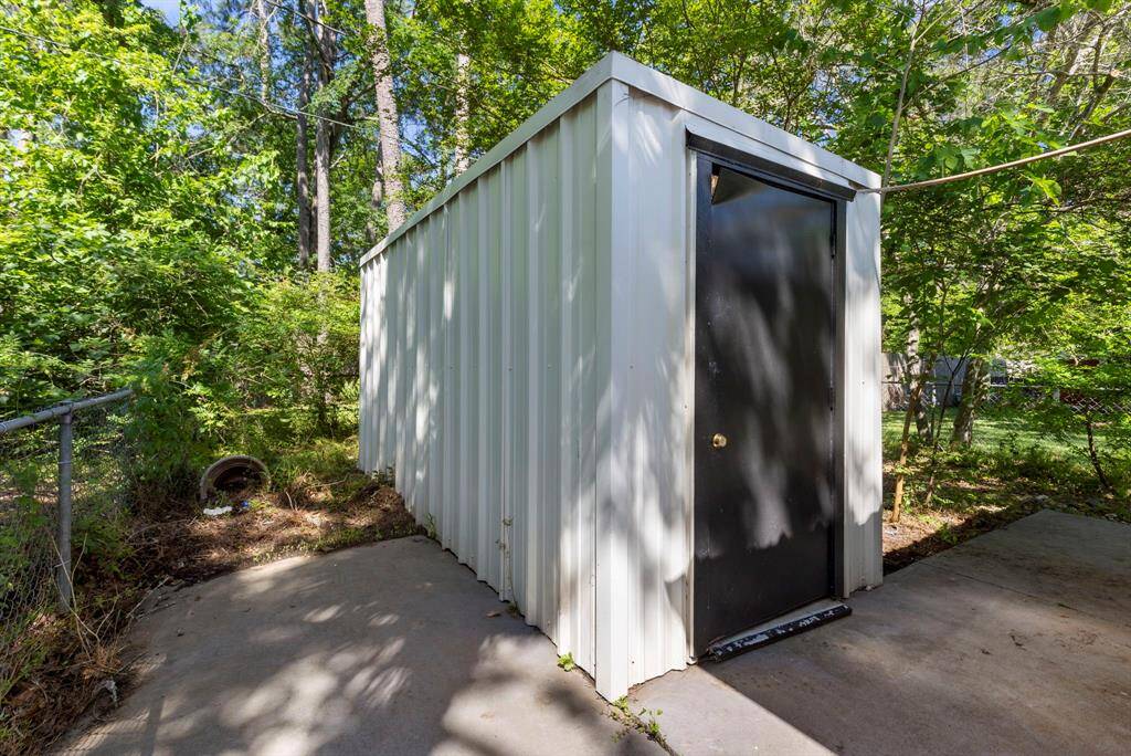 Located across from the flex room is additional storage.