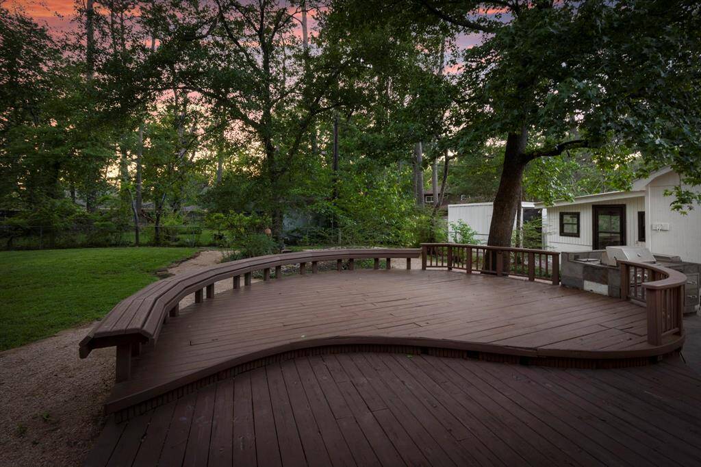 Add additional seating or install a hot tub in this updated deck near the outdoor kitchen.
