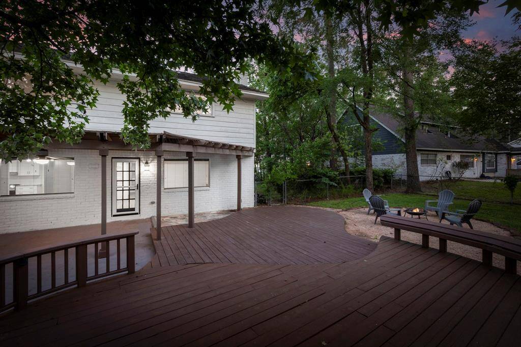 Add additional seating or install a hot tub in this updated deck near the outdoor kitchen.