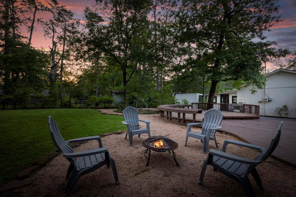 The backyard is ideal for hosting. There's even a gravel area for your fire pit!