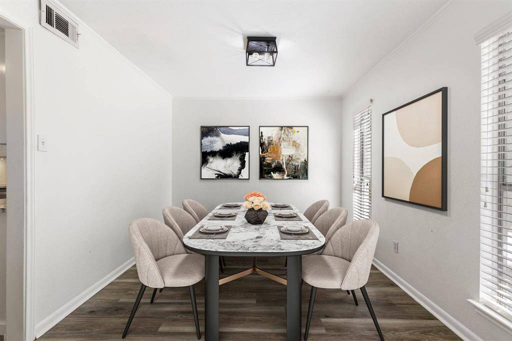 The dining room is THE spot for hosting and connects directly to the kitchen.