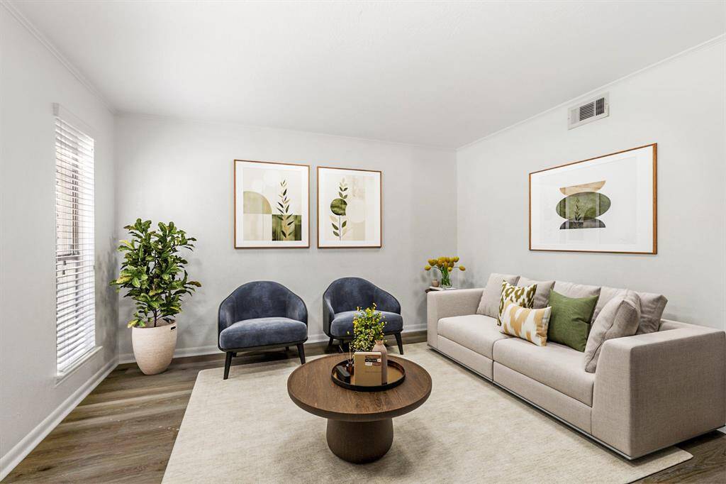 The formal living room is an ideal spot to host guests, convert to an office, or simply enjoy as a space to relax and read.