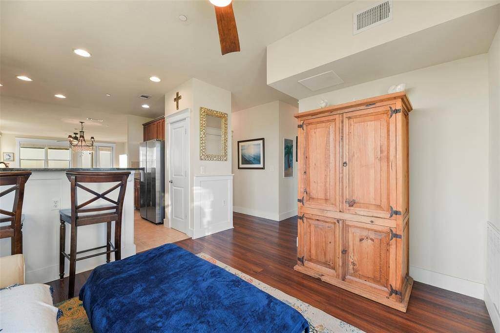 On the South side of the kitchen, we come to the family room.