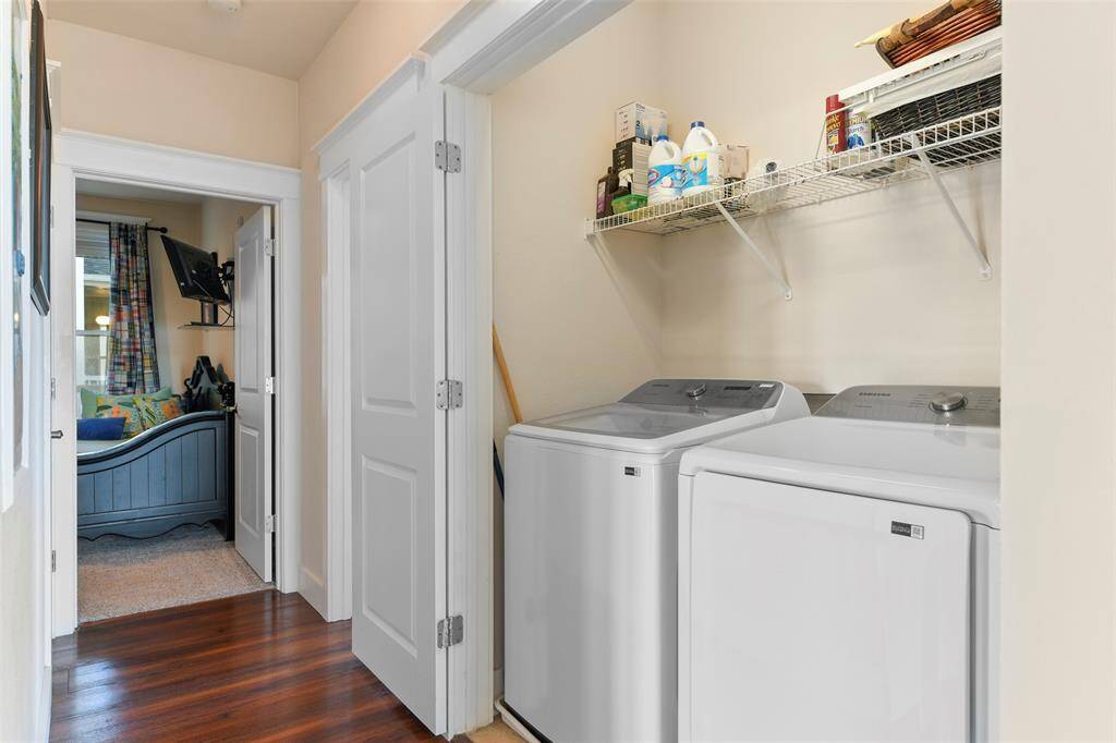 On our way to check out the secondary bedrooms, we come to the laundry area which features newer Samsung full size machines. All appliances to convey.
