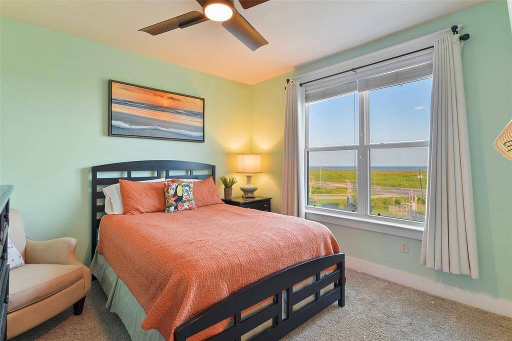 Secondary bedroom where your guests will be able to wake up to Gulf views.