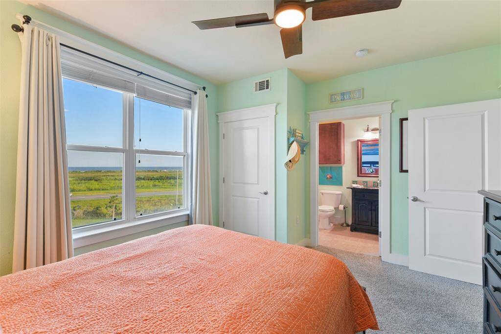 Notice the modern 4-blade ceiling fan.