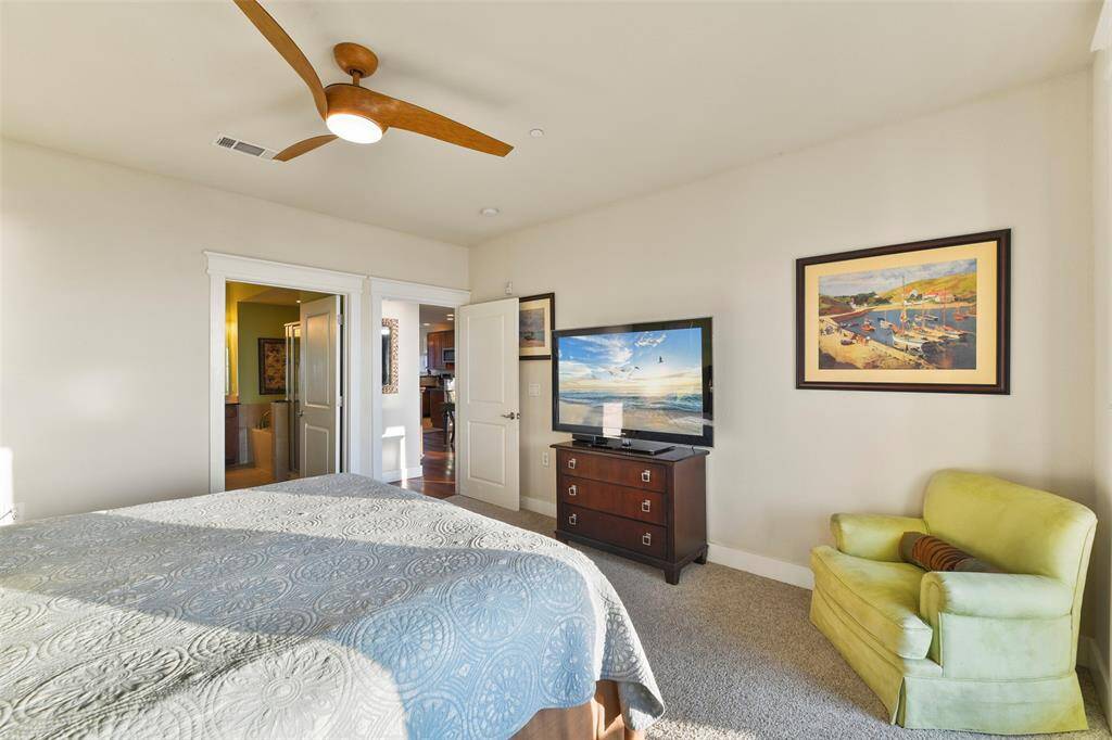 Notice the designer 3-blade ceiling fan.