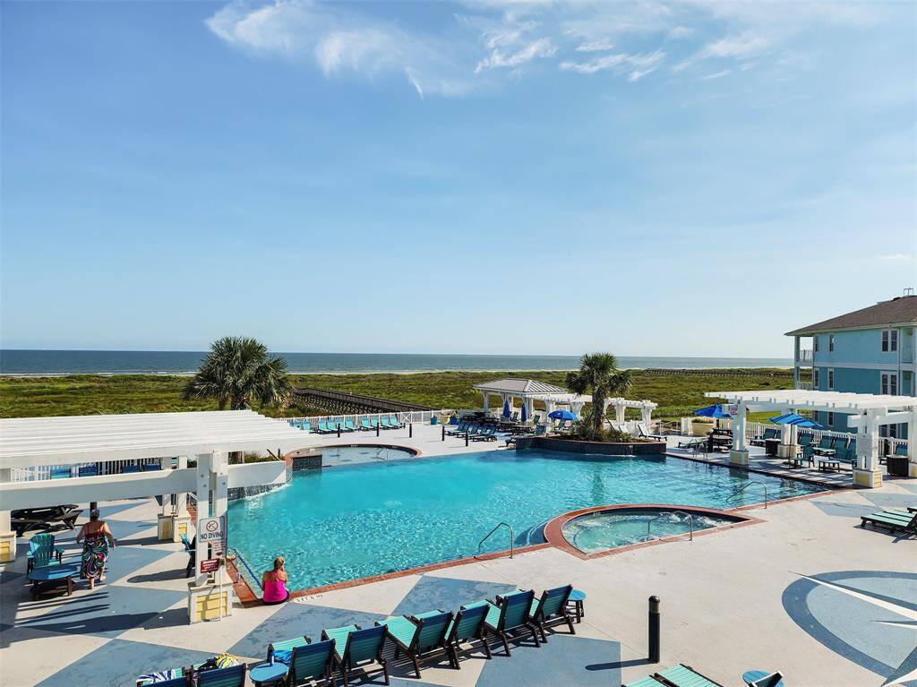 Refreshing infinity edge pool, hot tub, kiddie pool, expansive sun deck for lounging, and grill stations!