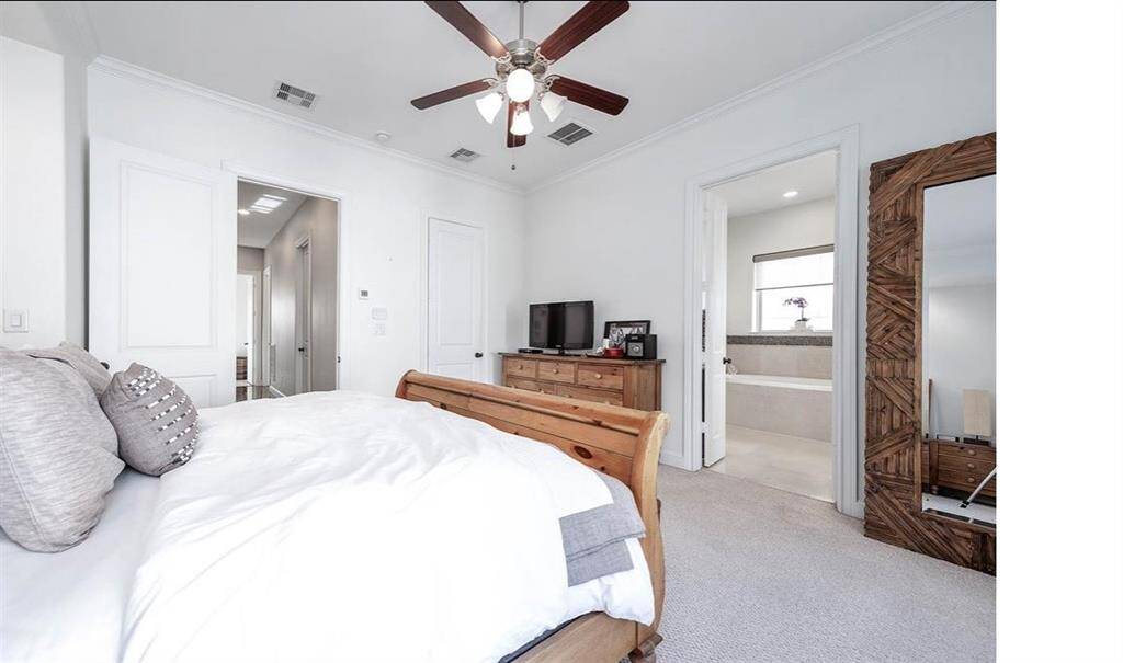 Ample space to create your own personal sanctuary, offering the perfect combination of comfort and style. First of two primary closets are located in the bdrm.