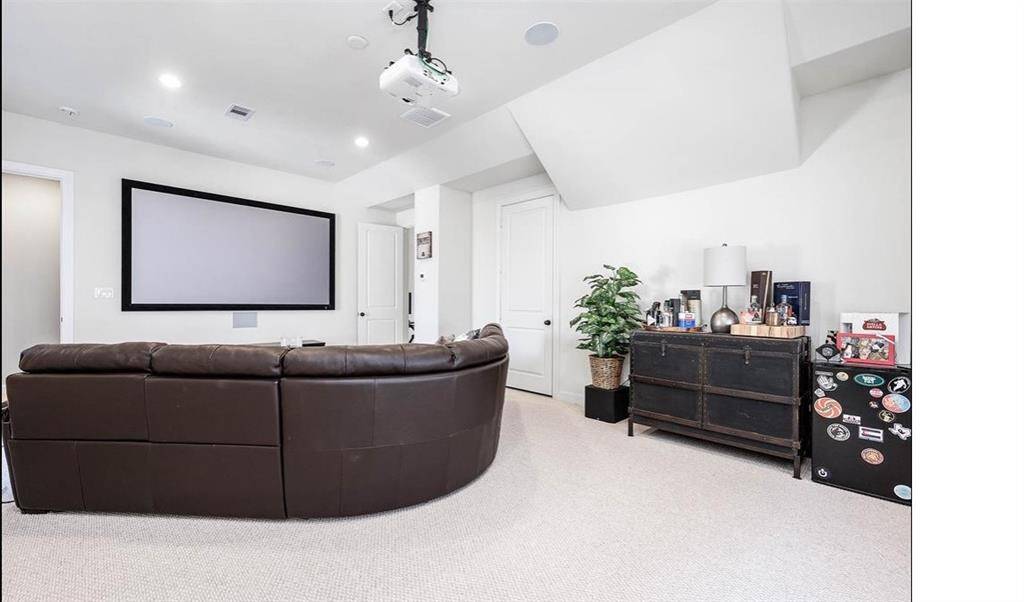 This versatile top floor room also includes a closet. Turn it into a bedroom or your family game room - perfect for entertaining!