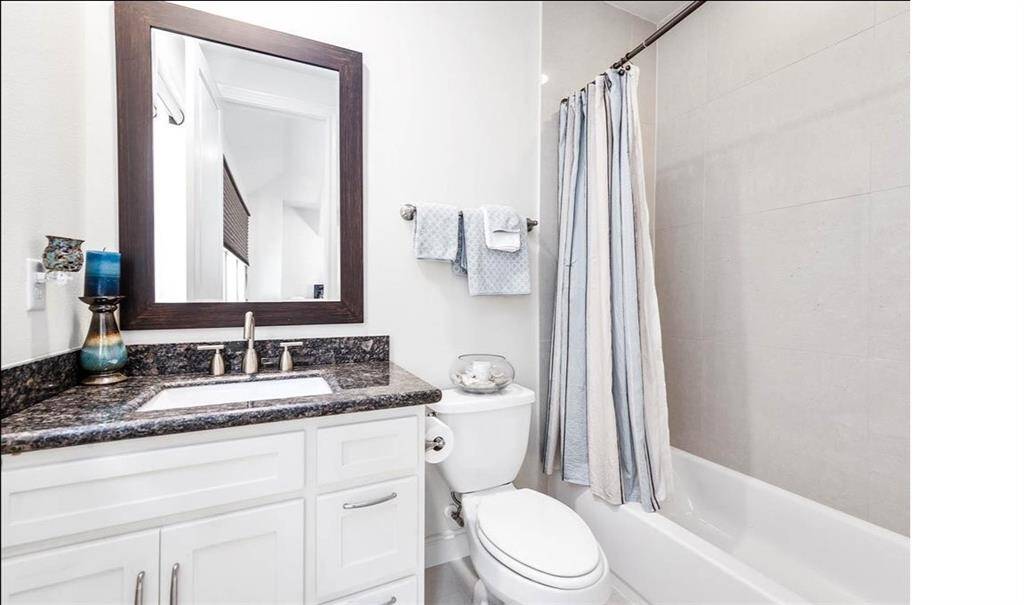 Secondary full bathroom conveniently located on the third floor.