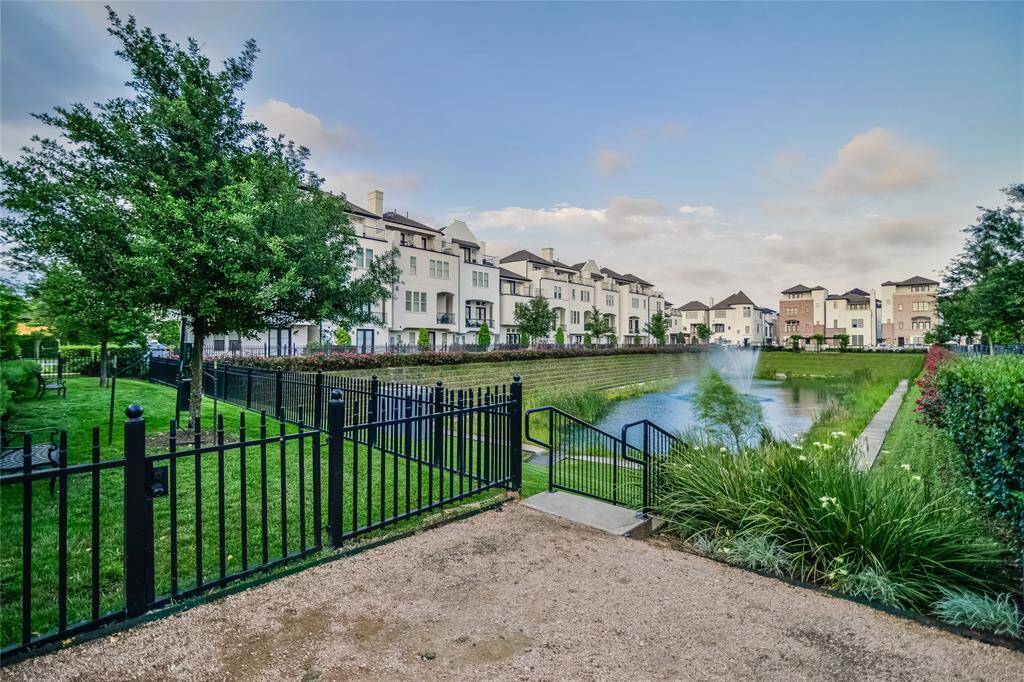 Enjoy a peaceful stroll  around the quaint community pond, a serene escape right in the heart of the city.