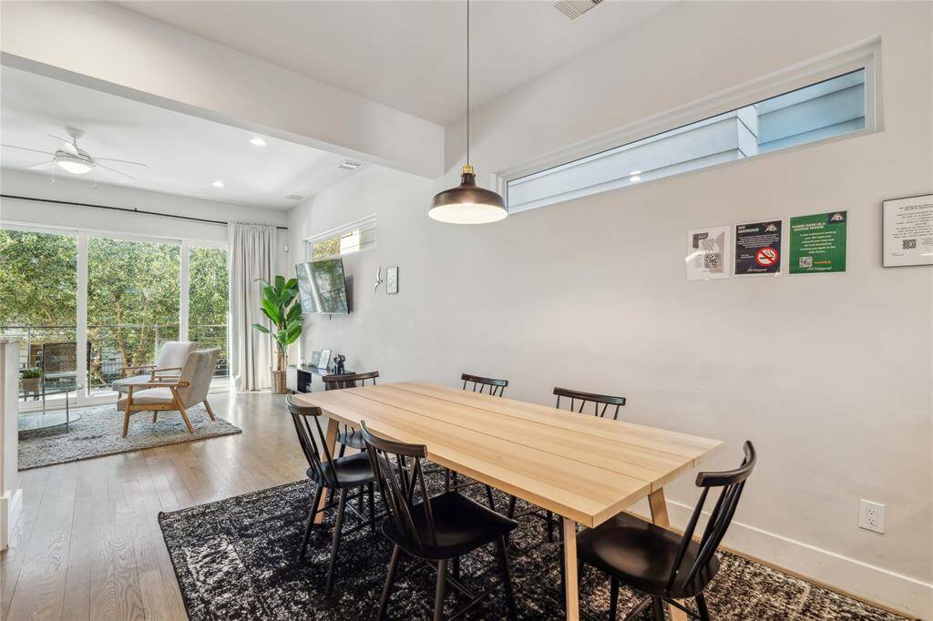 Adjacent to the kitchen, the dining space is open and inviting, with plenty of room for a formal dining table or casual seating.