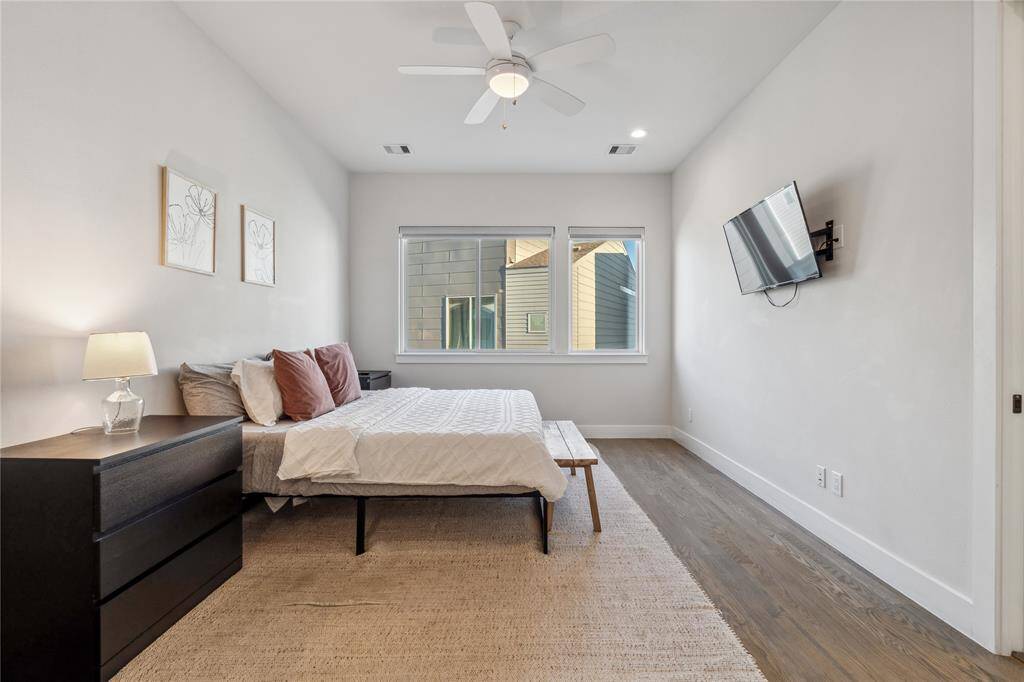 Designed for both relaxation and functionality, the bedroom easily accommodates a king-sized bed, nightstands, and additional seating or workspace.