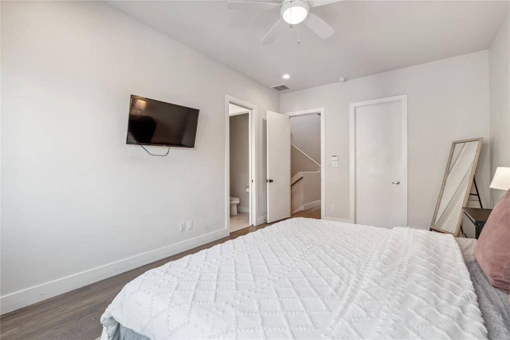 The primary suite seamlessly flows into the spa-like ensuite bathroom, creating a private and luxurious retreat.