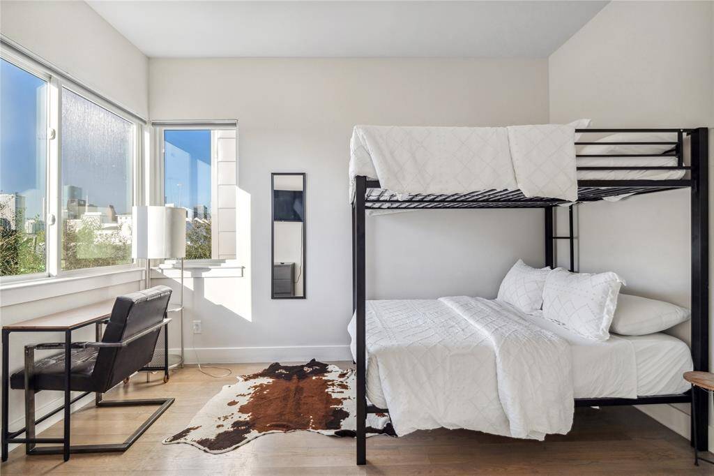 One bedroom may serve as a guest room, home office, or flex space, offering versatility to fit your lifestyle.