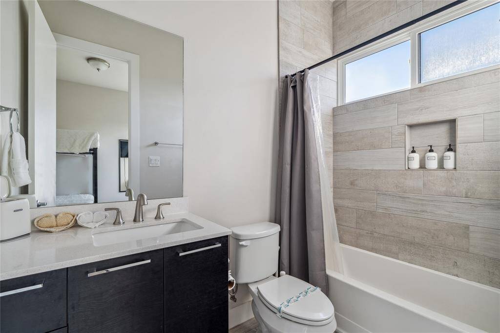 Each bathroom is thoughtfully designed with modern finishes, sleek vanities, and stylish tile work.