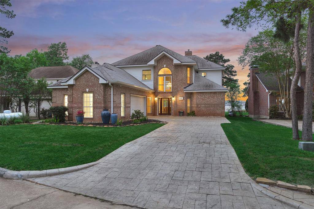 Welcome to this immaculately cared for home on the open shores of Lake Conroe!