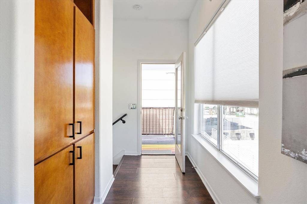 Enjoy the convenience of built-in storage and direct access to the balcony right off the main floor for easy indoor-outdoor living.