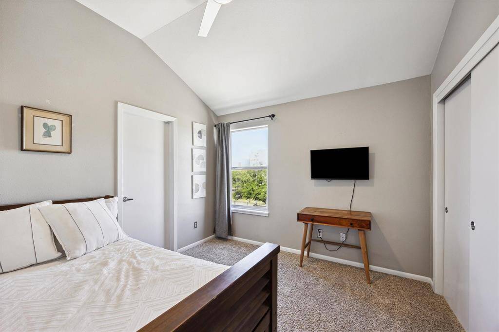 Family and guests will rest comfortably in this spacious suite with soft neutral finishes, a large closet, and ensuite access to a private bathroom.